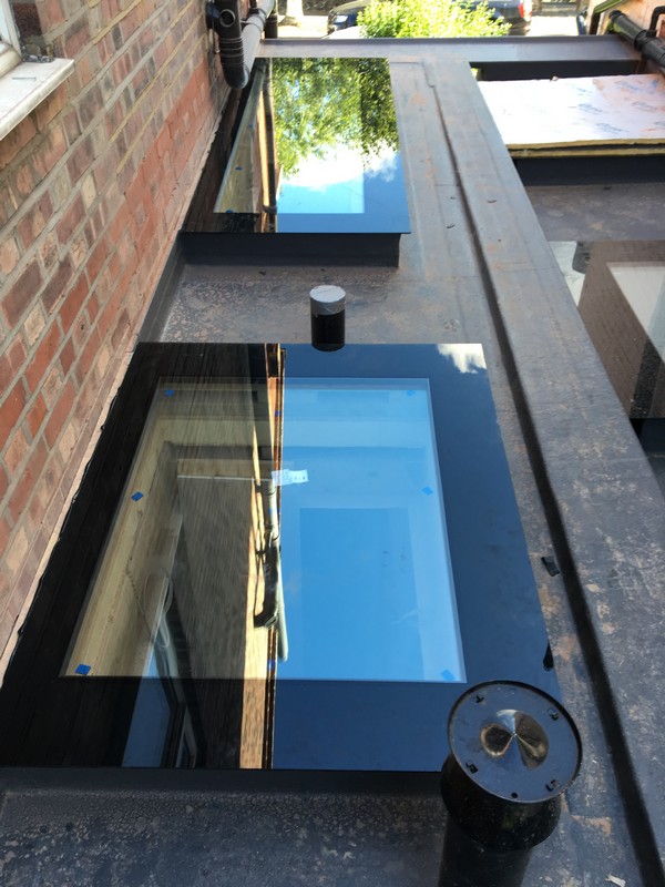 Multiple flat roof skylights on extension in East Sheen
